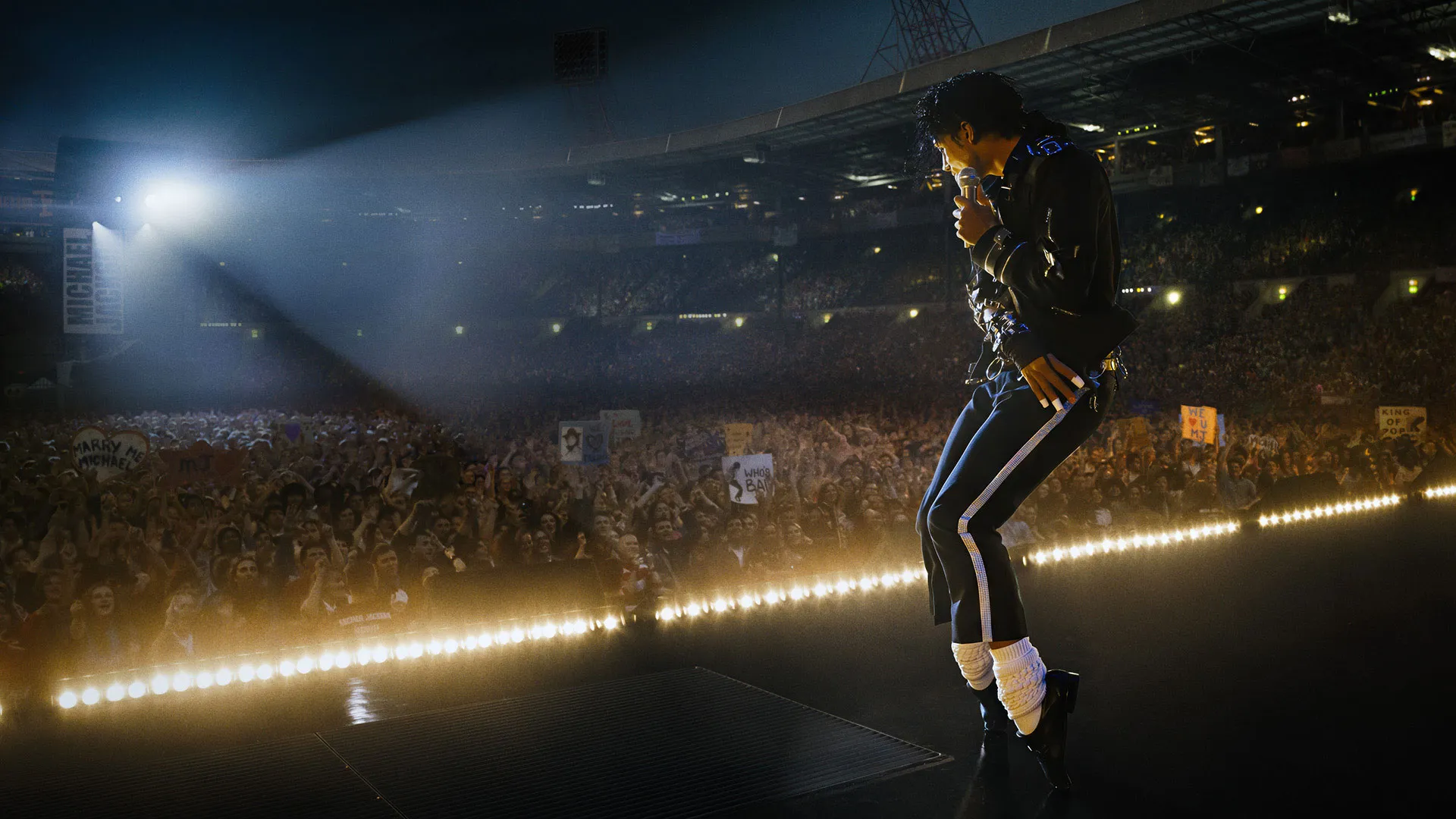 Jafaar Jackson as Michael on stage performing Bad